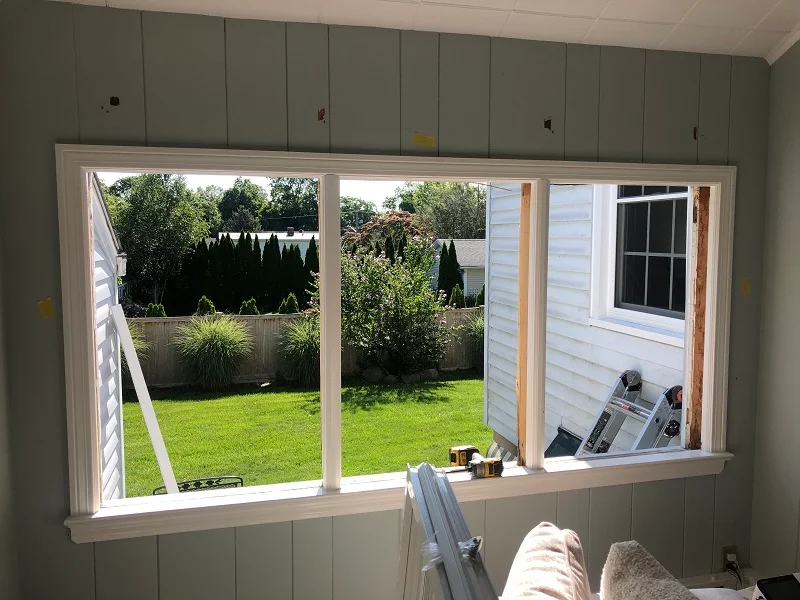Triple replacement double hung window removed and ready for installation
